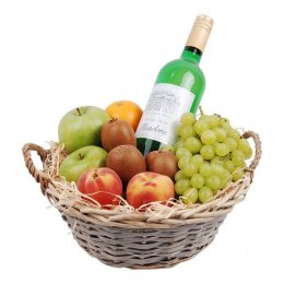 Fruitmand met witte wijn